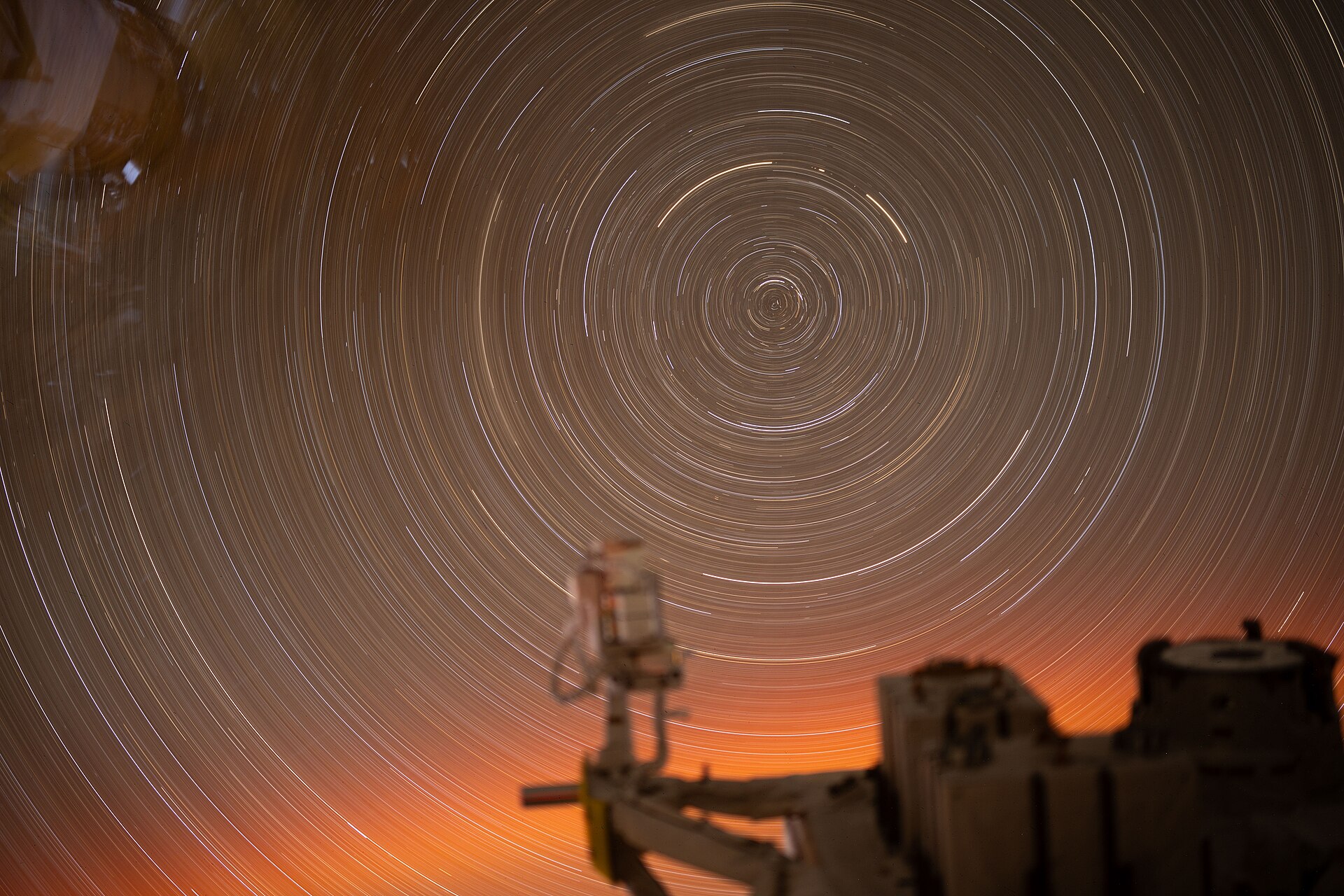 Circular arcs of star trails over Earth, viewed from the International Space
Station.
